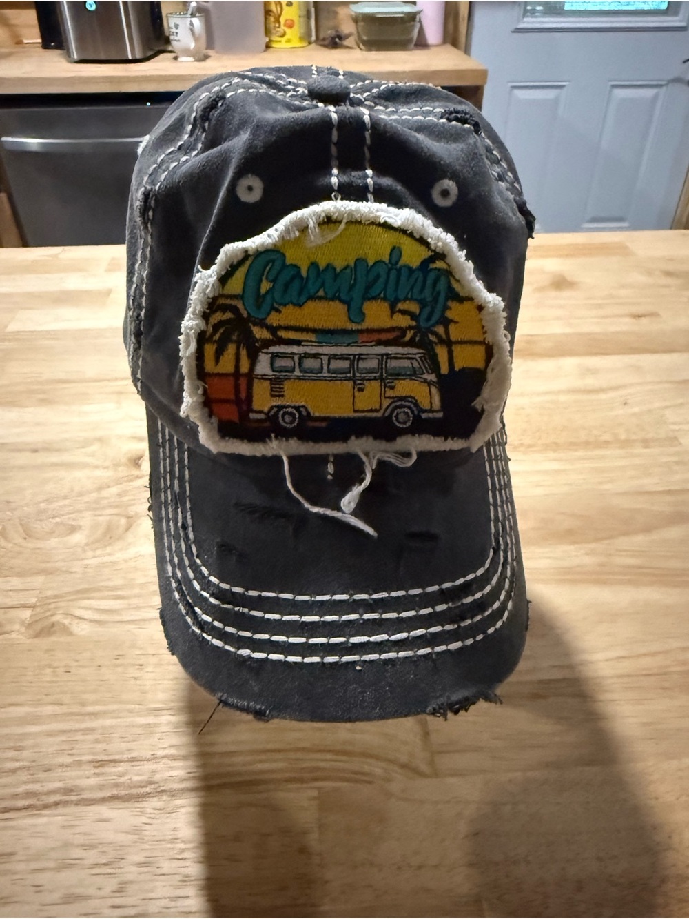 & Other Stories Distressed Black Baseball Cap with Yellow Camping Patch